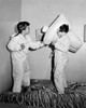 Side profile of two girls having a pillow fight Poster Print - Item # VARSAL25516472