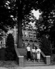 Three female students walking down steps and talking Poster Print - Item # VARSAL255419259