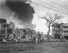 Group of people walking in front of burning buildings  Manila  Philippines Poster Print - Item # VARSAL25516813