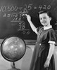 Schoolgirl doing mathematics on a blackboard Poster Print - Item # VARSAL2553417