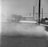 Car smoking on the road Poster Print - Item # VARSAL255417427