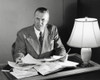 Businessman doing paperwork in an office Poster Print - Item # VARSAL25548288