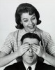 Close-up of a mid adult woman covering a mid adult man's eyes Poster Print - Item # VARSAL2557330