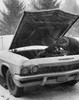Auto mechanic repairing a vintage car Poster Print - Item # VARSAL25518602