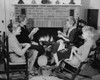 Senior women sitting in chairs near a fireplace and knitting Poster Print - Item # VARSAL25528235