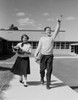 Boy and girl walking front school Poster Print - Item # VARSAL255422108