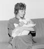 Close-up of a mother giving her infant a bottle Poster Print - Item # VARSAL2559857