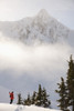 Snowboarder on a ridge with scenic mountains and fog in the background, Haines, Southeast Alaska PosterPrint - Item # VARDPI12250952