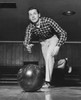 Young man bowling Poster Print - Item # VARSAL25519055