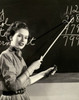 Side profile of a teacher pointing to a blackboard Poster Print - Item # VARSAL2553757