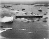 High angle view of a military ship and fireboats in the sea  SS United States  New York Harbor  New York City  New York State  USA Poster Print - Item # VARSAL25541049