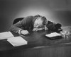 Businessman sleeping at a desk in an office Poster Print - Item # VARSAL25548319