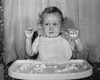 Close-up of a baby sitting in a high chair with food on his face and hands Poster Print - Item # VARSAL2551176A