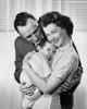 Mid adult couple holding baby and smiling Poster Print - Item # VARSAL2553172C