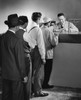 Group of people standing in line at a bank counter Poster Print - Item # VARSAL25515456