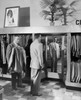 Young man trying suit in clothing store Poster Print - Item # VARSAL2555199