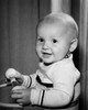 Portrait of smiling baby holding toy Poster Print - Item # VARSAL2559558