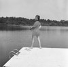 Mid adult woman fishing from jetty Poster Print - Item # VARSAL255416941
