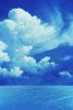 White clouds in dark blue sky over rippling water Poster Print by Panoramic Images (24 x 36) - Item # PPI118022