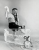 Side profile of a businessman sitting on ice using a telephone Poster Print - Item # VARSAL2551166