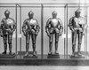 Suits of armor in a display cabinet Poster Print - Item # VARSAL25516832