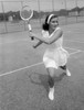 Young attractive woman playing tennis at tennis court Poster Print - Item # VARSAL255421956