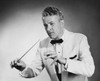 Close-up of a music conductor holding a conductor's baton Poster Print - Item # VARSAL2553359A