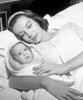 Mother with baby in bed Poster Print - Item # VARSAL2557530