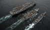 A replenishment at sea between USS Abraham Lincoln, USNS Guadalupe and USS Cape St. George Poster Print - Item # VARPSTSTK104872M