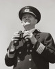 Low angle view of a ship captain holding binoculars Poster Print - Item # VARSAL2553702