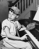 Side profile of a boy playing a piano Poster Print - Item # VARSAL25513167