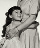 Side profile of girl hugging her mother Poster Print - Item # VARSAL2553167