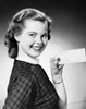 Portrait of a young woman holding a check and smiling Poster Print - Item # VARSAL25534351