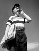Low angle view of a boy selling newspapers Poster Print - Item # VARSAL25527393B