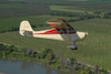 Aeronca Chief flying over Sacramento Valley, California. Poster Print - Item # VARPSTPWA100018M