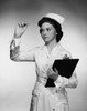 Close-up of a female nurse reading a thermometer and holding a clipboard Poster Print - Item # VARSAL25516336