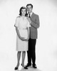 Young man standing with his arm around a young woman Poster Print - Item # VARSAL25541312