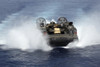 Red Sea, May 25, 2013 - A landing craft air cushion from Assault Craft Unit 4 approaches the amphibious assault ship USS Kearsarge Poster Print - Item # VARPSTSTK107612M