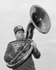 Low angle view of a young man playing the tuba Poster Print - Item # VARSAL25518665