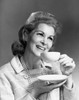 Close-up of a mature woman drinking from a tea cup Poster Print - Item # VARSAL25512649