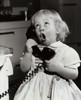 Close-up of a girl talking on the telephone Poster Print - Item # VARSAL255848