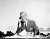 Businessman talking on the telephone in an office Poster Print - Item # VARSAL25515951