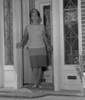 Woman standing on porch Poster Print - Item # VARSAL25528173