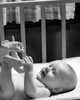 Portrait of cheerful baby with feet up Poster Print - Item # VARSAL2559619