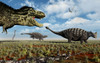A carnivorous Tyrannosaurus Rex hunting down a pair of Ankylosaurus dinosaurs during Earth's Cretaceous Period. Poster Print - Item # VARPSTMAS100680P