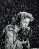 Side profile of a young woman sneezing in a snow fall Poster Print - Item # VARSAL2554108