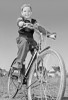 Low angle view of a boy riding a bicycle Poster Print - Item # VARSAL2558817B