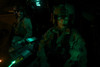 Pilots equipped with night vision goggles in the cockpit of a UH-60 Black Hawk helicopter at Davis Monthan Air Force Base, Arizona Poster Print - Item # VARPSTTMO100966M