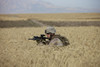 U.S. Marine patrols a wadi near Konduz, Afghanistan clearing it for a range exercise Poster Print - Item # VARPSTTMO100293M