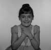 Studio shot of girl with hands on chest Poster Print - Item # VARSAL25514059